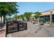 Bustling street with various shops and outdoor seating at 7447 Quay St, Arvada, CO 80003