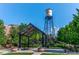 Relaxing town square with water tower and covered seating at 7447 Quay St, Arvada, CO 80003