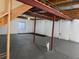 A bright basement with insulated walls and exposed ceiling rafters at 20148 E Dartmouth Dr, Aurora, CO 80013