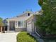 Beautiful single-story home featuring a brick facade, attached garage, and well-maintained landscaping at 20148 E Dartmouth Dr, Aurora, CO 80013