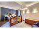 Cozy bedroom featuring a wooden bed frame, plush carpet, and relaxing atmosphere with plenty of space at 9724 Iris St, Broomfield, CO 80021
