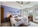 Comfortable main bedroom featuring a ceiling fan, and sunny windows at 9724 Iris St, Broomfield, CO 80021