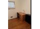 Cozy bedroom with wood desk and chair near the window providing natural light at 3905 Nelson St, Wheat Ridge, CO 80033