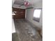 View of a home's empty garage showing concrete floors at 3905 Nelson St, Wheat Ridge, CO 80033