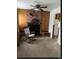 Charming living room with a brick fireplace, comfortable seating, and access to the kitchen at 3905 Nelson St, Wheat Ridge, CO 80033