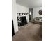 Inviting living room with comfortable seating, neutral carpet, and an open layout at 3905 Nelson St, Wheat Ridge, CO 80033