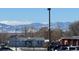 View of home and mountain range in the distance at 7600 Monaco St, Commerce City, CO 80022