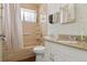 A bathroom with a shower, sink, and toilet at 7600 Monaco St, Commerce City, CO 80022