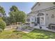 Back yard featuring a pergola, nice patio, and a charming white picket fence at 2265 S Depew St, Denver, CO 80227