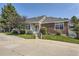 Charming single-story home with mature landscaping and a well-manicured front yard at 2265 S Depew St, Denver, CO 80227