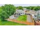 The landscaped backyard with a deck, and a storage shed surrounded by a wood fence adds a special touch at 12366 Elm Way, Thornton, CO 80241