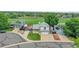 A well-maintained two-story home near a park featuring a two-car garage, curb appeal, and solar panels at 12366 Elm Way, Thornton, CO 80241