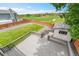 Spacious deck offers a view of the backyard and the neighboring green space at 12366 Elm Way, Thornton, CO 80241