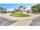 Attractive home exterior with a spacious front yard and a two car garage at 12366 Elm Way, Thornton, CO 80241