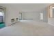 Open living room with sliding glass doors to balcony and neutral decor at 3144 S Wheeling Way # 206, Aurora, CO 80014