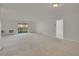 Well-lit living room with balcony and view at 3144 S Wheeling Way # 206, Aurora, CO 80014
