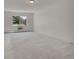Spacious living room with large window and wall unit at 3144 S Wheeling Way # 206, Aurora, CO 80014