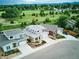 Aerial view of the homes, showcasing their manicured lawns and proximity to green spaces at 6096 W Keene Ave, Denver, CO 80235