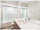 Modern bathroom with glass enclosed shower at 6096 W Keene Ave, Denver, CO 80235