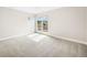 Bright bedroom featuring a large window with natural light at 6096 W Keene Ave, Denver, CO 80235