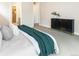 Spacious bedroom offering a view of a closet, and stylish black furniture at 6096 W Keene Ave, Denver, CO 80235