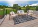 Cozy outdoor deck with comfortable seating and scenic views of the golf course at 6096 W Keene Ave, Denver, CO 80235