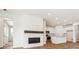 View of the living room with a fireplace and kitchen at 39171 Anthony St, Elizabeth, CO 80107
