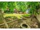 A multilevel backyard with stone retaining walls and a fire pit, perfect for outdoor enjoyment at 10224 W 68Th Way, Arvada, CO 80004