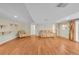 Spacious basement featuring vinyl flooring and comfortable furniture creating a relaxing atmosphere at 10224 W 68Th Way, Arvada, CO 80004