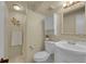 Cozy bathroom features a shower, vanity and toilet at 10224 W 68Th Way, Arvada, CO 80004