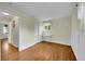 A bedroom offers a closet, window and desk; hardwood floors throughout at 10224 W 68Th Way, Arvada, CO 80004