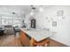 Kitchen island featuring granite countertop, stainless dishwasher with open floorplan views at 4431 N Quatar Ct, Aurora, CO 80019