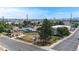 Aerial view of residential neighborhood and property in the city at 598 S Navajo St, Denver, CO 80223