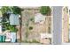 Aerial shot showcases the home's positioning on a large lot next to a neighboring street at 598 S Navajo St, Denver, CO 80223
