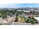 Expansive aerial view showcasing the city skyline, a mix of homes, and commercial buildings at 598 S Navajo St, Denver, CO 80223
