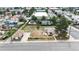 Aerial view of a residential neighborhood with a single-Gathering home and outbuildings at 598 S Navajo St, Denver, CO 80223