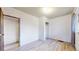 Clean, simple bedroom with ample closet space and updated flooring for modern comfort at 598 S Navajo St, Denver, CO 80223