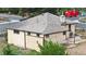 A rear exterior view of the house shows the structure's design and roofline at 598 S Navajo St, Denver, CO 80223