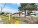 Cozy single-story home with a vintage charm and mature tree in a residential neighborhood at 598 S Navajo St, Denver, CO 80223