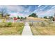 Sidewalk gate leading up to the house provides easy access to the property at 598 S Navajo St, Denver, CO 80223