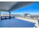 Expansive outdoor balcony with wooden floors and dark railings offers panoramic mountain views at 8509 Orchard City Dr, Littleton, CO 80125