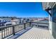 Enjoy mountain views from this spacious wood deck, perfect for relaxing outdoors in a vibrant neighborhood at 8509 Orchard City Dr, Littleton, CO 80125