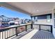 The wood deck offers panoramic neighborhood vistas from this home at 8509 Orchard City Dr, Littleton, CO 80125
