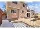 A backyard patio with a house in the background at 7288 S Zephyr Way, Littleton, CO 80128