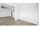 Open carpeted bedroom featuring a ceiling fan and neutral colored walls at 23505 E Platte Dr # 8D, Aurora, CO 80016