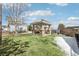 Exterior shot of a covered gazebo in a community space with manicured lawn and nearby playground equipment at 23505 E Platte Dr # 8D, Aurora, CO 80016