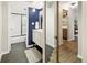 Modern bathroom with navy blue walls and hexagon floor tiles at 2 Adams St # 108, Denver, CO 80206