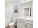 Bathroom featuring white fixtures and shower/tub combo at 8850 Sedalia St, Commerce City, CO 80022