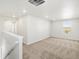 Upstairs bedroom features neutral carpet, bright walls and natural light at 8850 Sedalia St, Commerce City, CO 80022