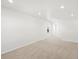 Upstairs bedroom features neutral carpet, bright walls and natural light at 8850 Sedalia St, Commerce City, CO 80022